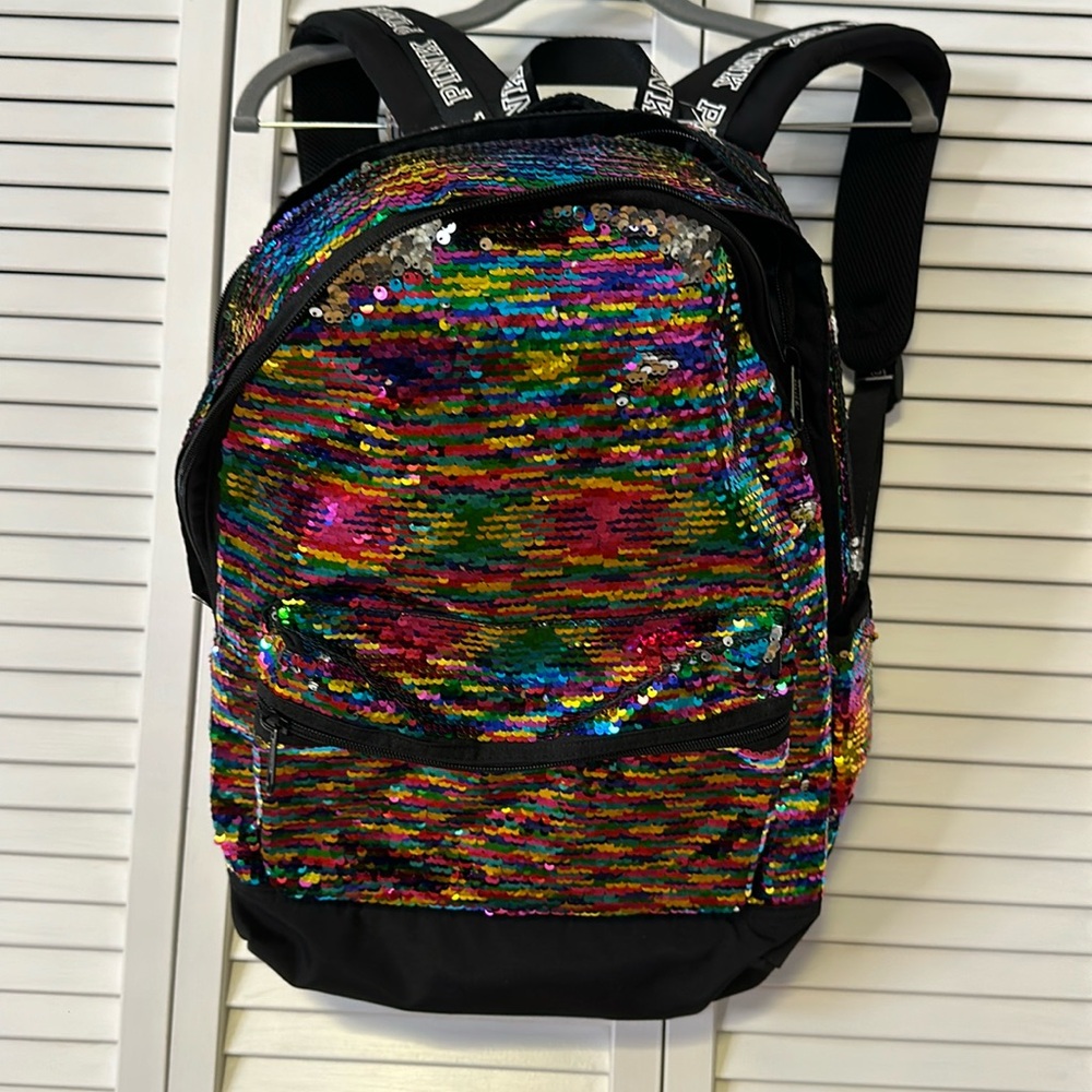Pink rainbow sequined back pack.
